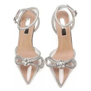 Clear stilettos with rhinestone bows